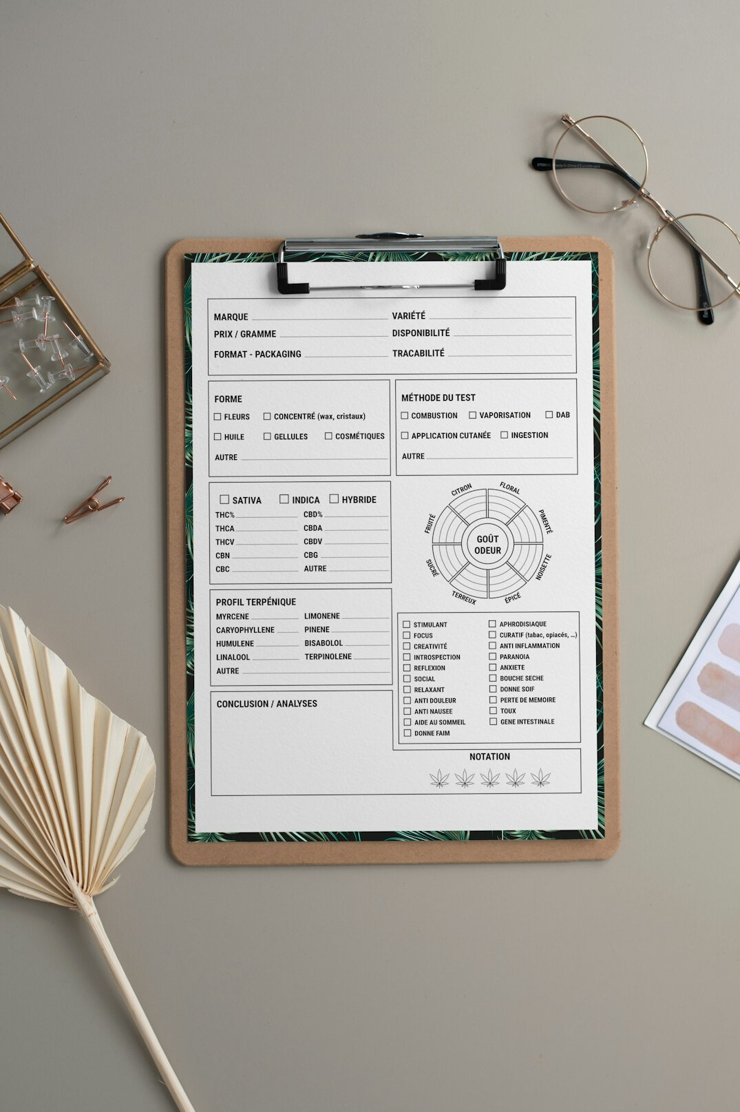 Clipboard with a printed survey questionnaire and a pen on a wooden desk